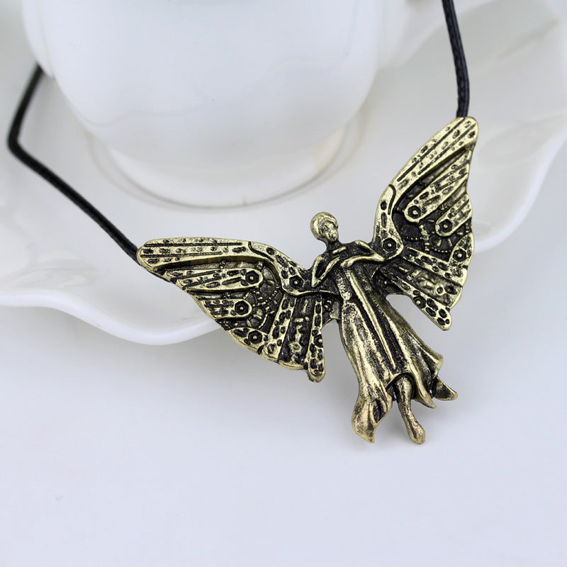 Squelettique Ville Collier Pendentif Avec Des Ailes D'ange