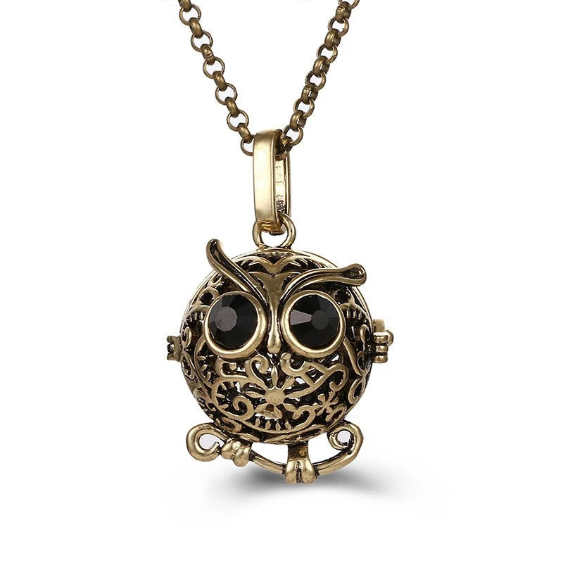 Nouveau charme carillon du mexique ailes d'ange creuses collier Vintage bijoux boule de musique pendentif aromatique pour les femmes accessoires de mode d'été