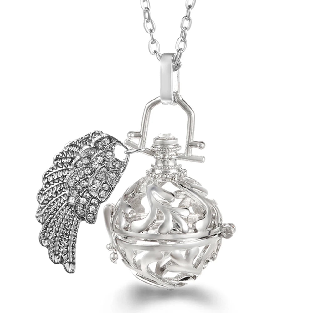 Collier Bola Mexique avec ailes d'ange, arbre de vie – diffuseur d'huile essentielle aromathérapie, pendentif parfumé pour femme, idée cadeau raffinée.
