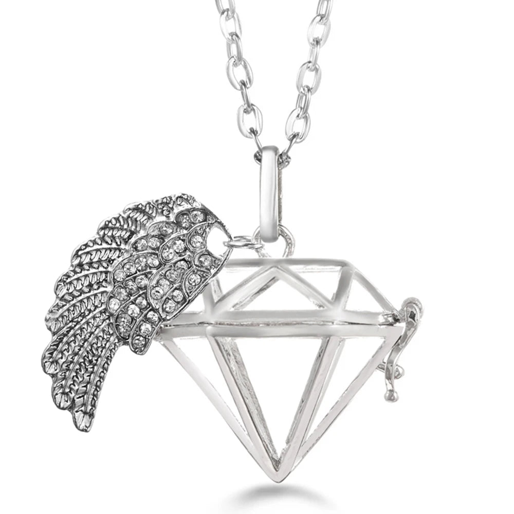 Collier Bola Mexique avec ailes d'ange, arbre de vie – diffuseur d'huile essentielle aromathérapie, pendentif parfumé pour femme, idée cadeau raffinée.