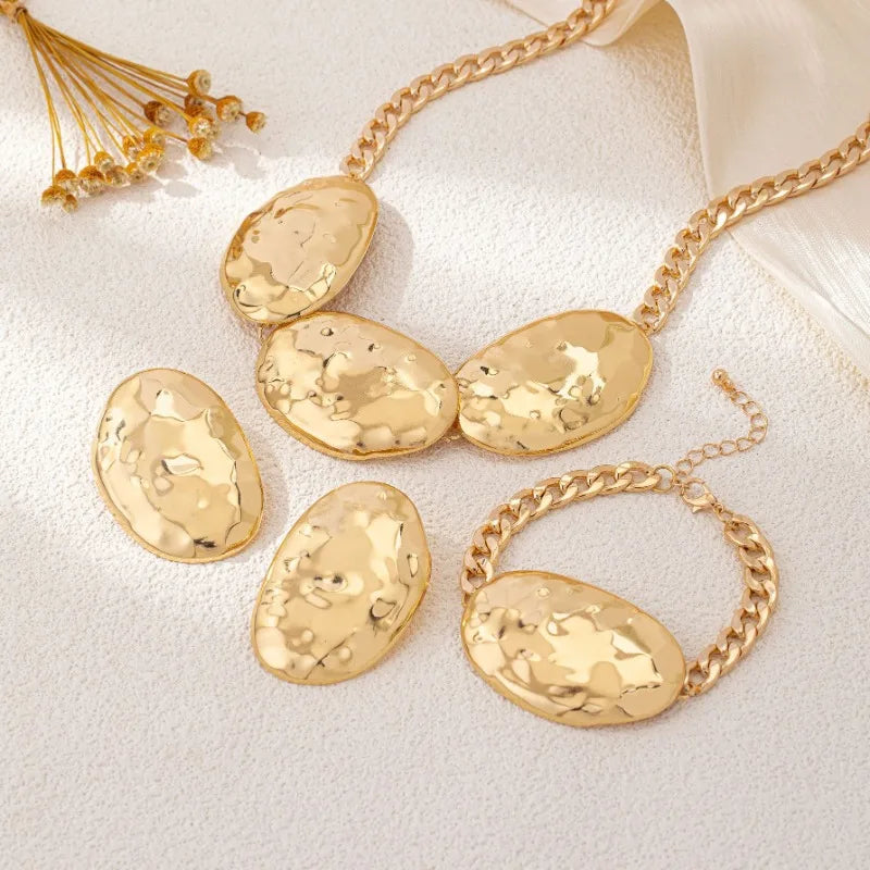 Ensemble de boucles d'oreilles ovales à motif de battement géométrique exagéré, collier et Bracelet pour femmes et filles, bijoux de fête à la mode DS046