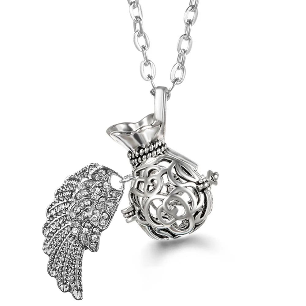 Collier Bola Mexique avec ailes d'ange, arbre de vie – diffuseur d'huile essentielle aromathérapie, pendentif parfumé pour femme, idée cadeau raffinée.