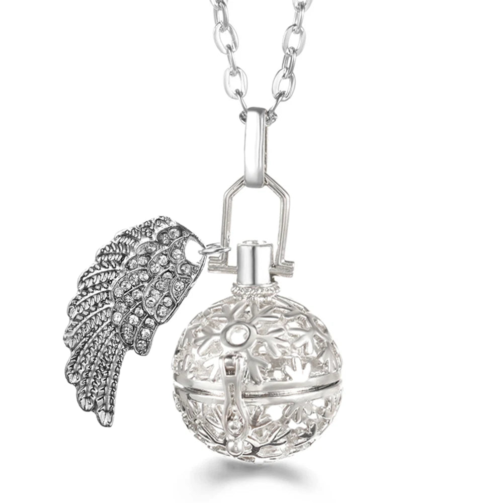 Collier Bola Mexique avec ailes d'ange, arbre de vie – diffuseur d'huile essentielle aromathérapie, pendentif parfumé pour femme, idée cadeau raffinée.