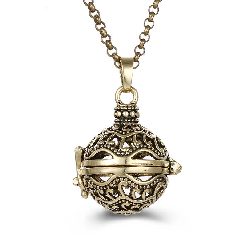 Nouveau charme carillon du mexique ailes d'ange creuses collier Vintage bijoux boule de musique pendentif aromatique pour les femmes accessoires de mode d'été