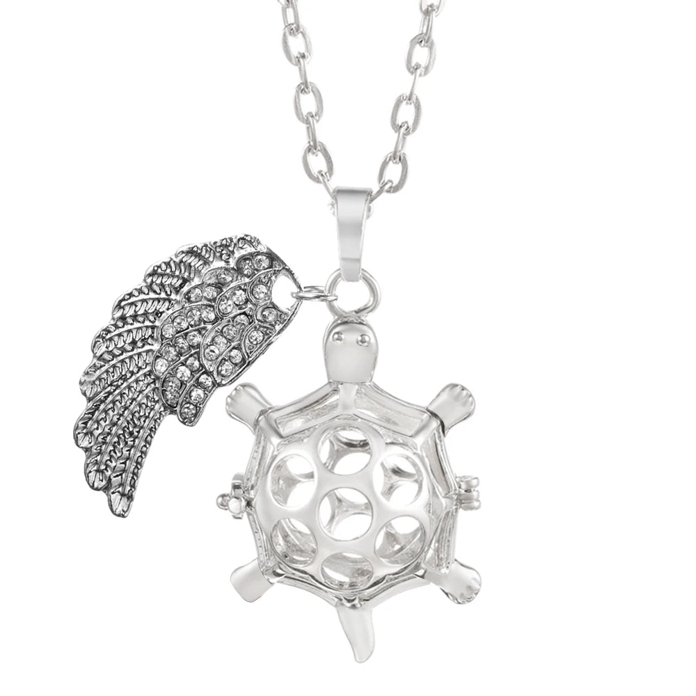 Collier Bola Mexique avec ailes d'ange, arbre de vie – diffuseur d'huile essentielle aromathérapie, pendentif parfumé pour femme, idée cadeau raffinée.