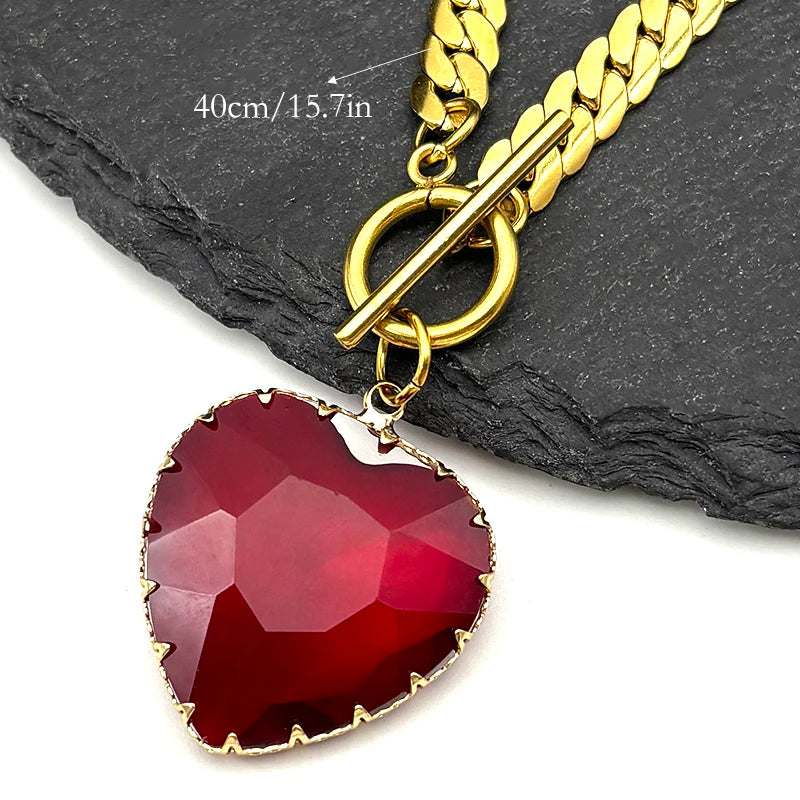 Collier ras du cou gothique punk en acier inoxydable avec pendentif cœur rouge en verre pour femmes