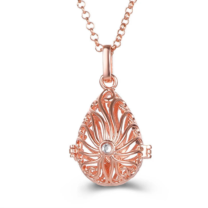Nouveau charme carillon du mexique ailes d'ange creuses collier Vintage bijoux boule de musique pendentif aromatique pour les femmes accessoires de mode d'été
