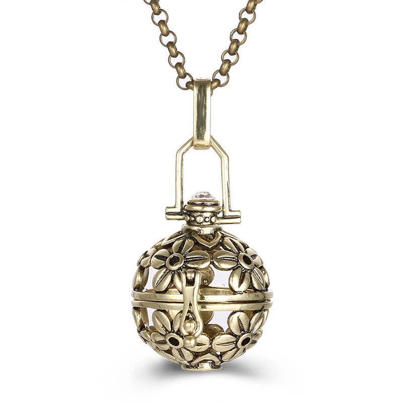 Nouveau charme carillon du mexique ailes d'ange creuses collier Vintage bijoux boule de musique pendentif aromatique pour les femmes accessoires de mode d'été