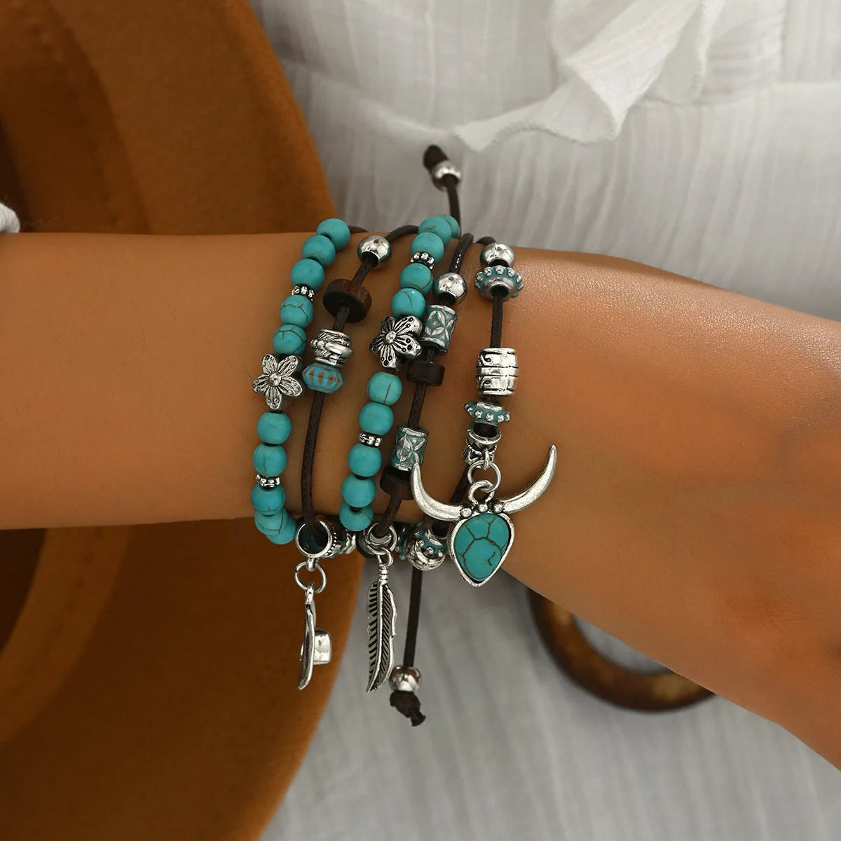 Chapeau de pays occidental tête d'animal feuille plume femmes Bracelets porte-bonheur femmes Bracelets en cuir hommes bracelet en gros bijoux cadeau