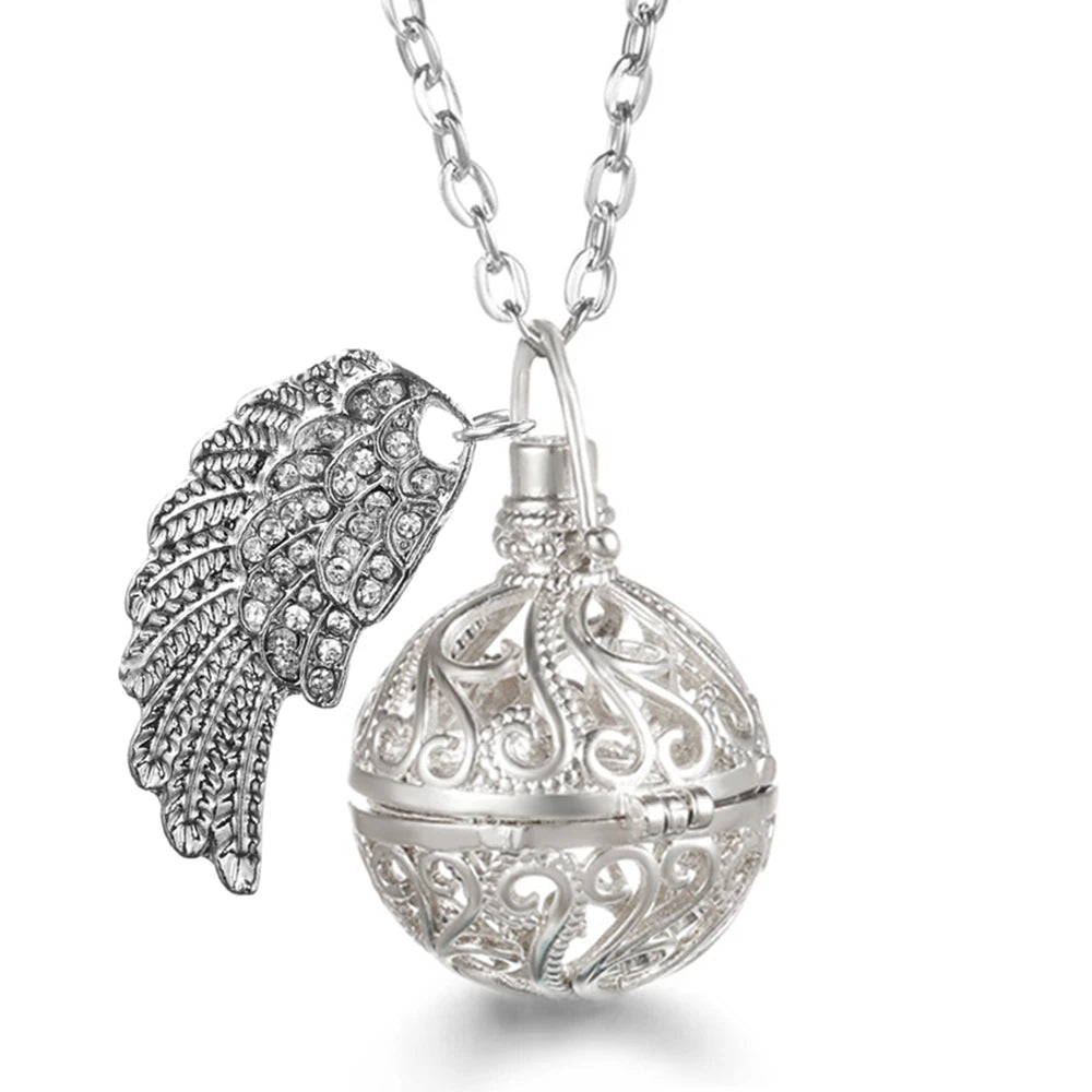 Collier Bola Mexique avec ailes d'ange, arbre de vie – diffuseur d'huile essentielle aromathérapie, pendentif parfumé pour femme, idée cadeau raffinée.
