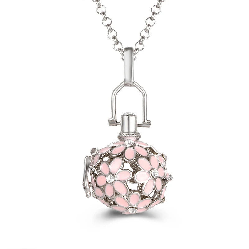 Nouveau charme carillon du mexique ailes d'ange creuses collier Vintage bijoux boule de musique pendentif aromatique pour les femmes accessoires de mode d'été