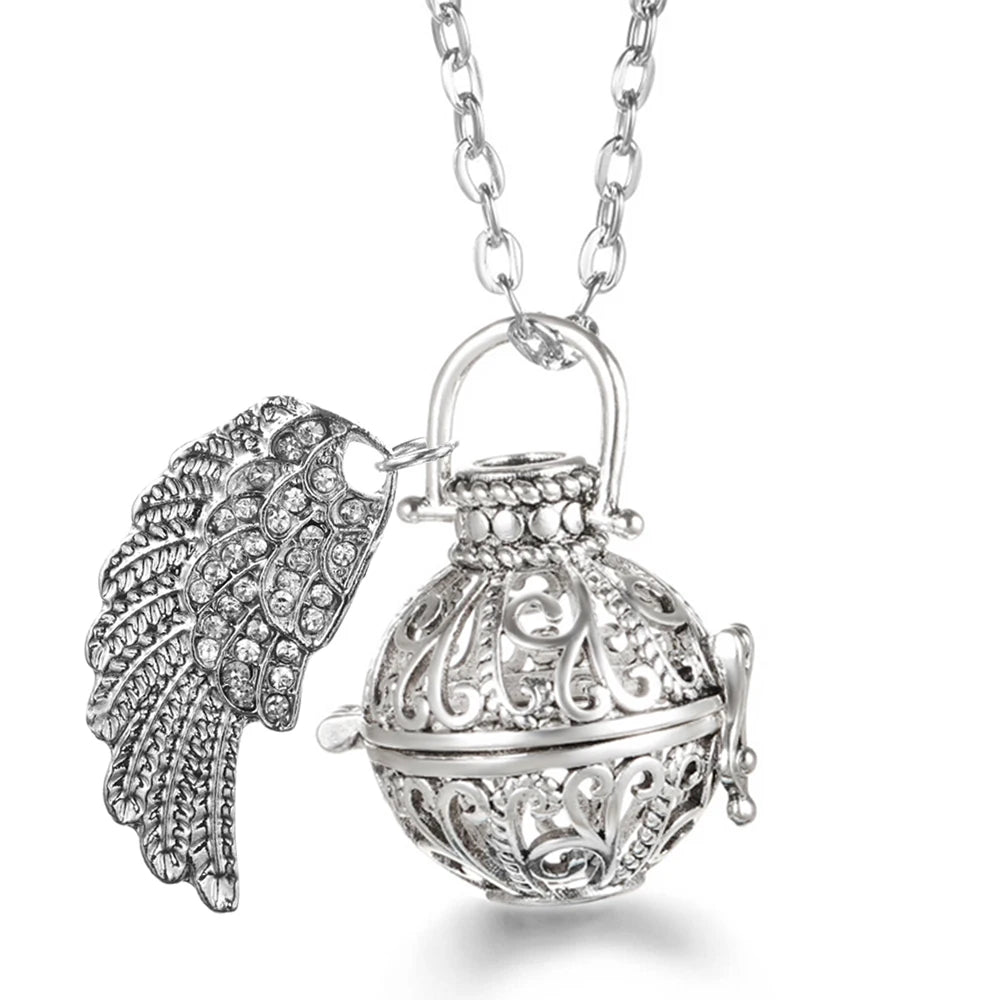 Collier Bola Mexique avec ailes d'ange, arbre de vie – diffuseur d'huile essentielle aromathérapie, pendentif parfumé pour femme, idée cadeau raffinée.