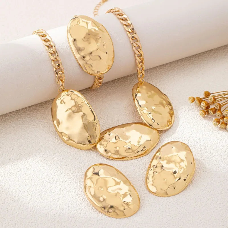 Ensemble de boucles d'oreilles ovales à motif de battement géométrique exagéré, collier et Bracelet pour femmes et filles, bijoux de fête à la mode DS046