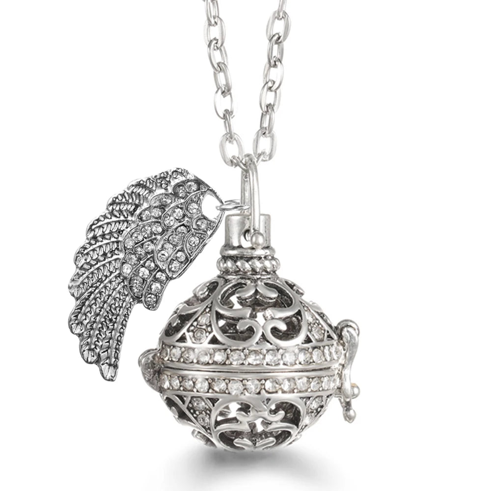 Collier Bola Mexique avec ailes d'ange, arbre de vie – diffuseur d'huile essentielle aromathérapie, pendentif parfumé pour femme, idée cadeau raffinée.