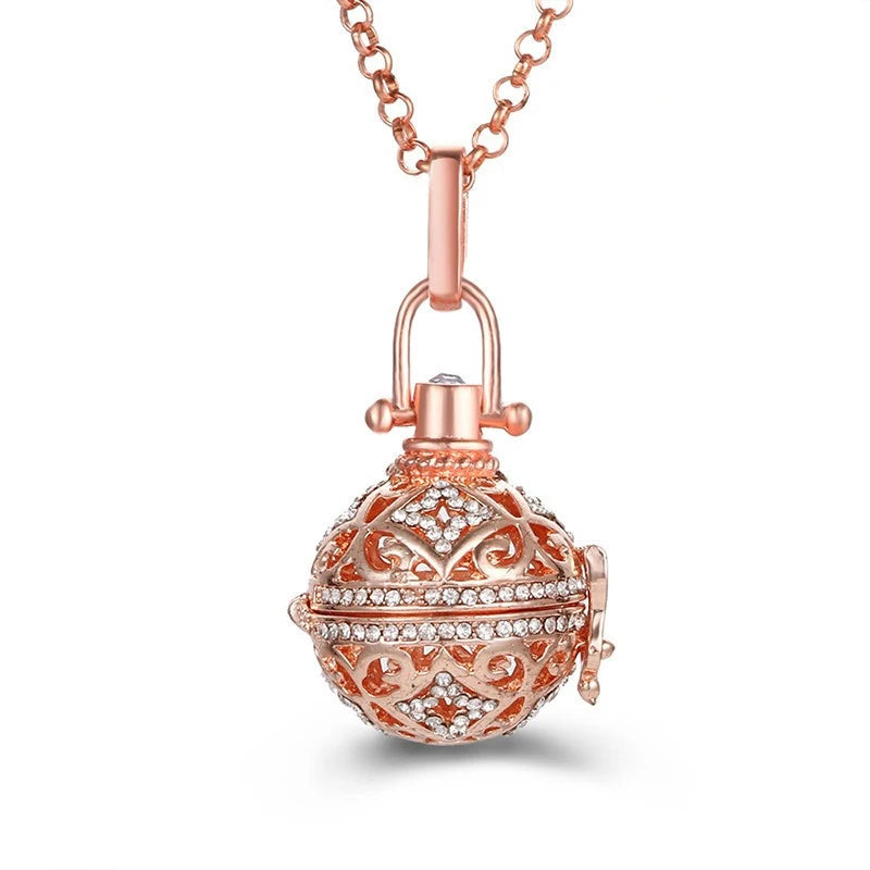 Nouveau charme carillon du mexique ailes d'ange creuses collier Vintage bijoux boule de musique pendentif aromatique pour les femmes accessoires de mode d'été