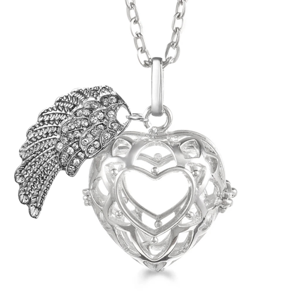 Collier Bola Mexique avec ailes d'ange, arbre de vie – diffuseur d'huile essentielle aromathérapie, pendentif parfumé pour femme, idée cadeau raffinée.