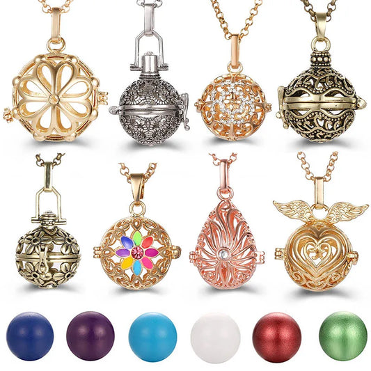 Nouveau charme carillon du mexique ailes d'ange creuses collier Vintage bijoux boule de musique pendentif aromatique pour les femmes accessoires de mode d'été