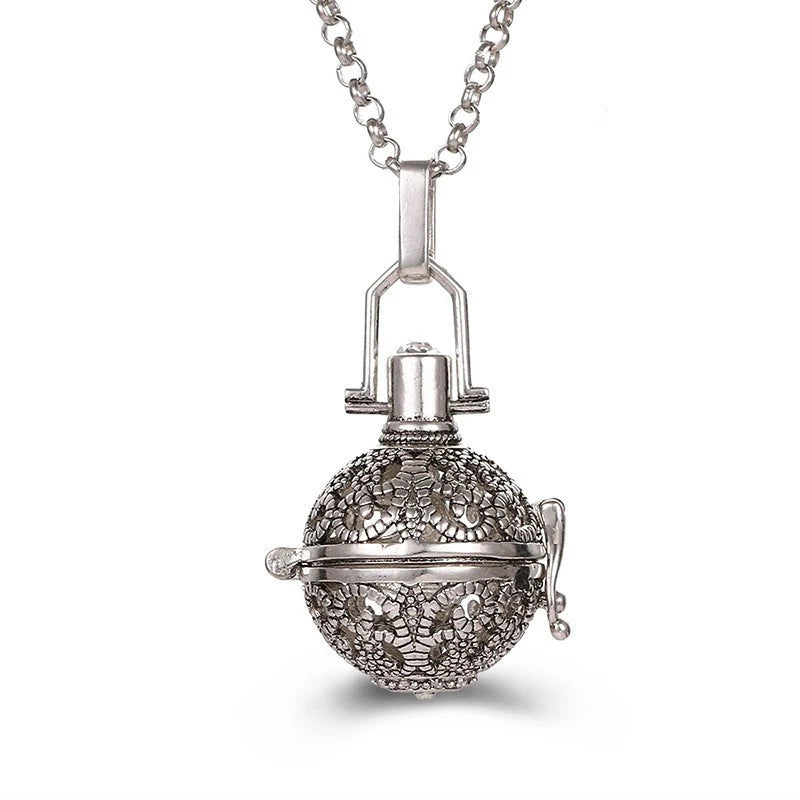 Nouveau charme carillon du mexique ailes d'ange creuses collier Vintage bijoux boule de musique pendentif aromatique pour les femmes accessoires de mode d'été