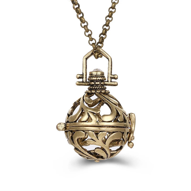 Nouveau charme carillon du mexique ailes d'ange creuses collier Vintage bijoux boule de musique pendentif aromatique pour les femmes accessoires de mode d'été