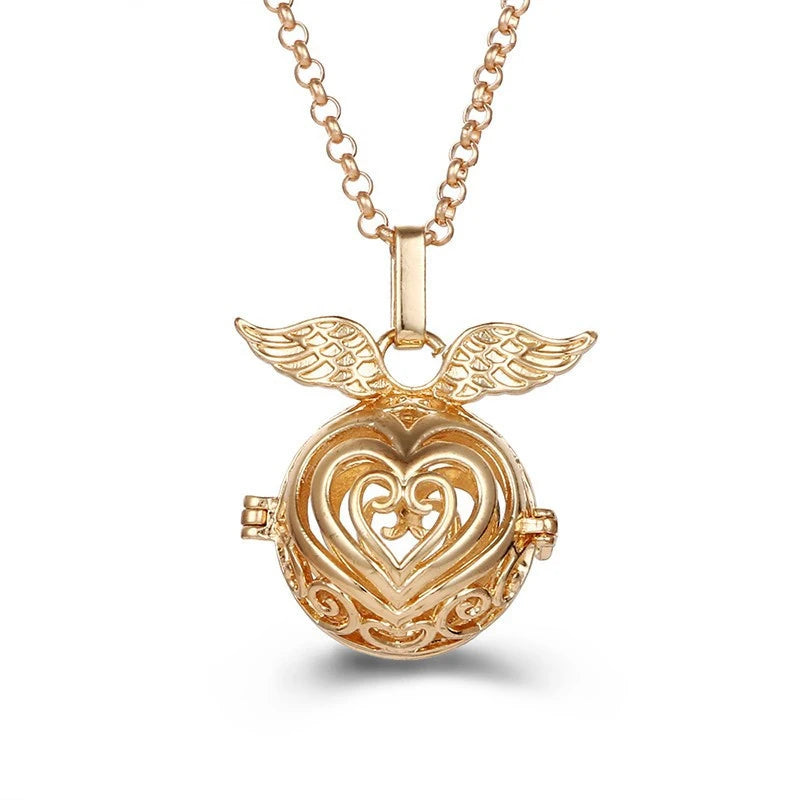 Nouveau charme carillon du mexique ailes d'ange creuses collier Vintage bijoux boule de musique pendentif aromatique pour les femmes accessoires de mode d'été
