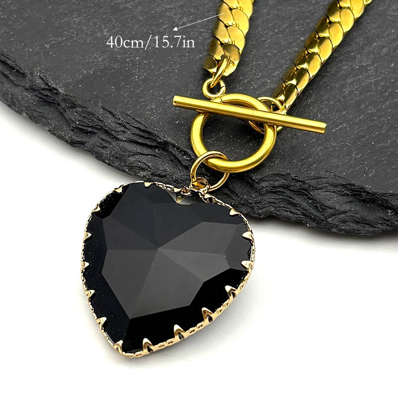 Collier ras du cou gothique punk en acier inoxydable avec pendentif cœur rouge en verre pour femmes