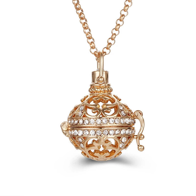 Nouveau charme carillon du mexique ailes d'ange creuses collier Vintage bijoux boule de musique pendentif aromatique pour les femmes accessoires de mode d'été