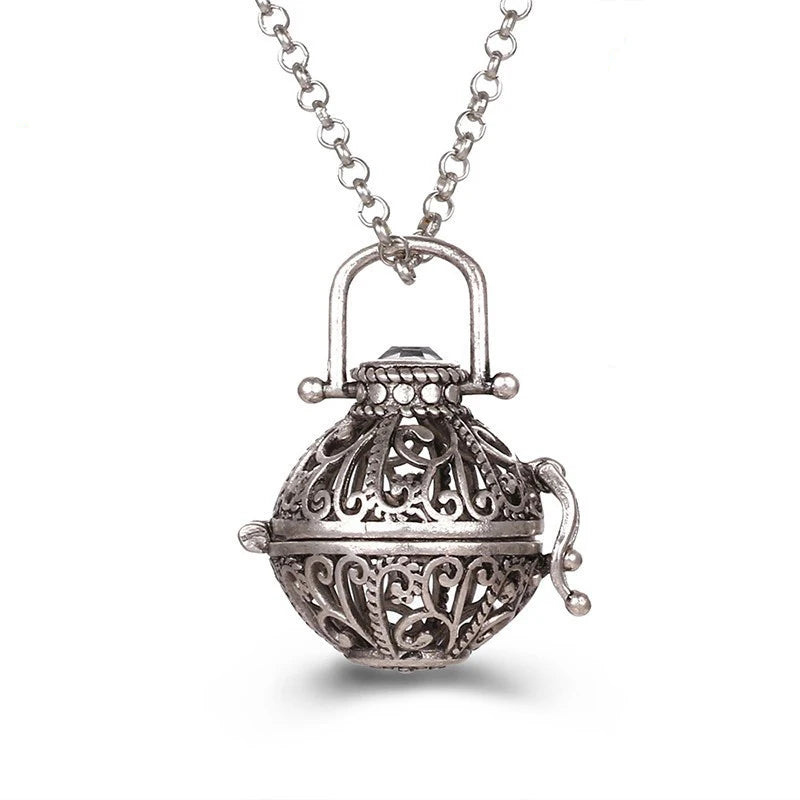 Nouveau charme carillon du mexique ailes d'ange creuses collier Vintage bijoux boule de musique pendentif aromatique pour les femmes accessoires de mode d'été