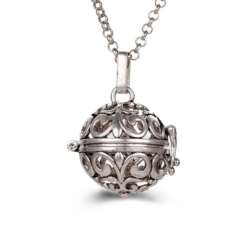 Nouveau charme carillon du mexique ailes d'ange creuses collier Vintage bijoux boule de musique pendentif aromatique pour les femmes accessoires de mode d'été